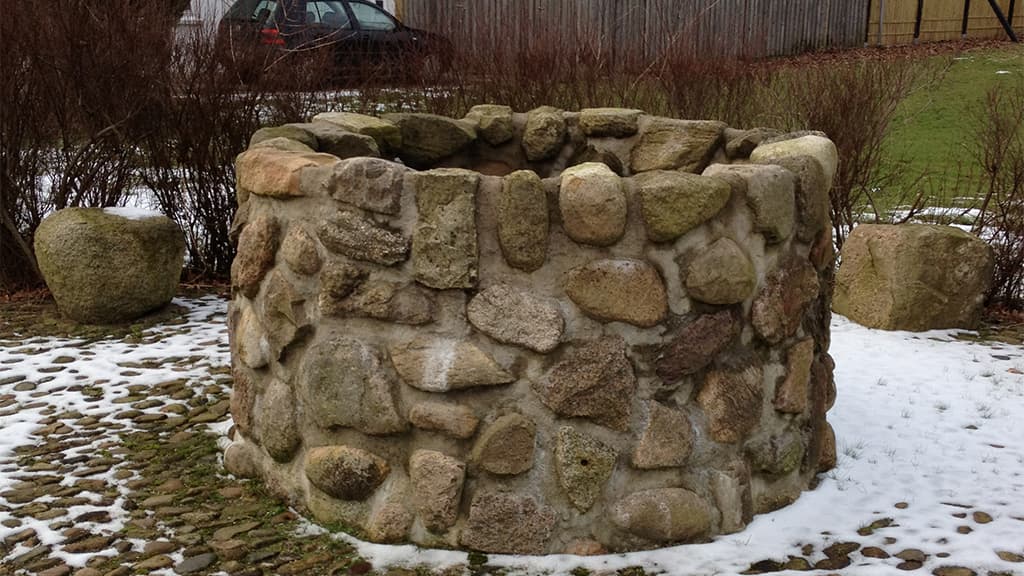 The village well in Gammelby